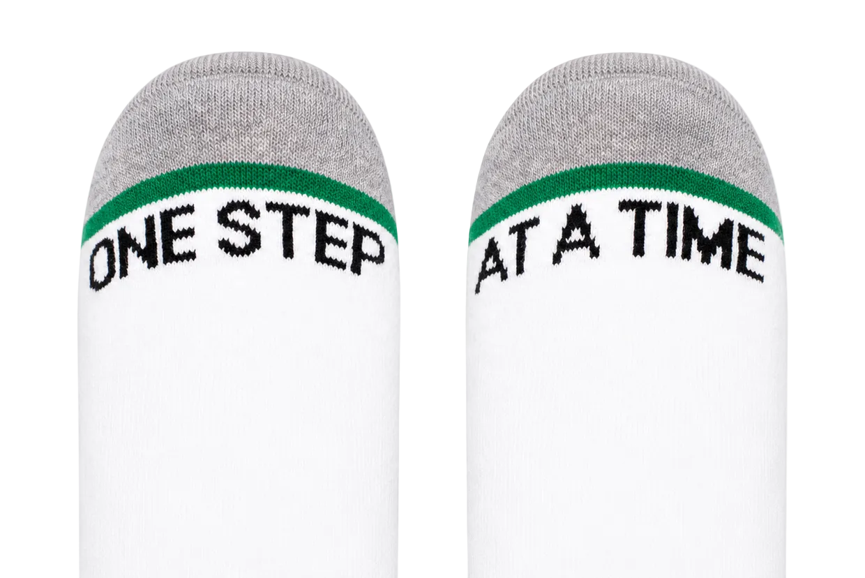 "ONE STEP AT A TIME" (SOCKS)